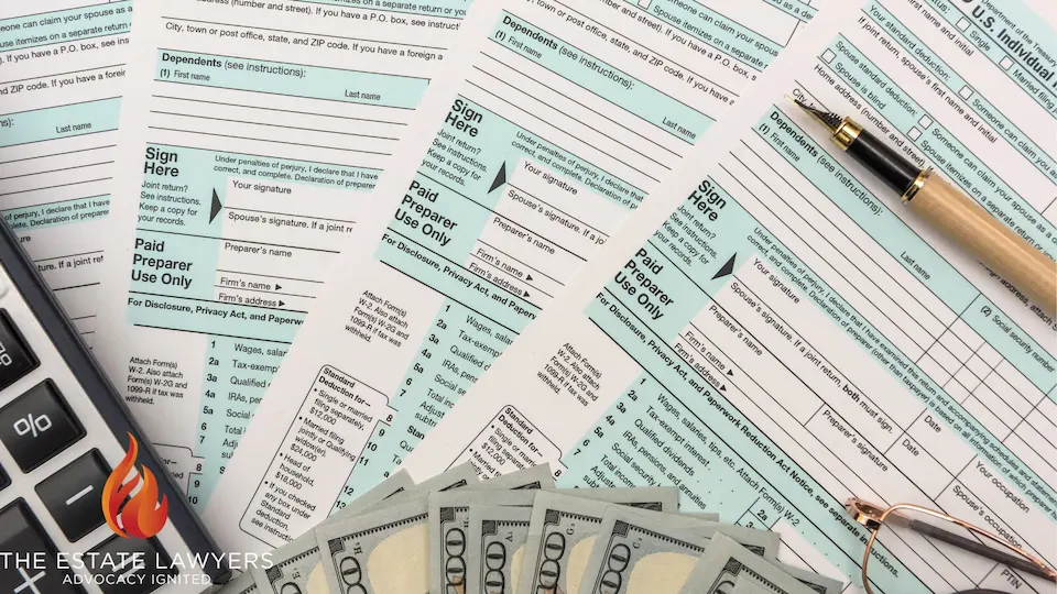 Tax forms, money, calculator, and pen