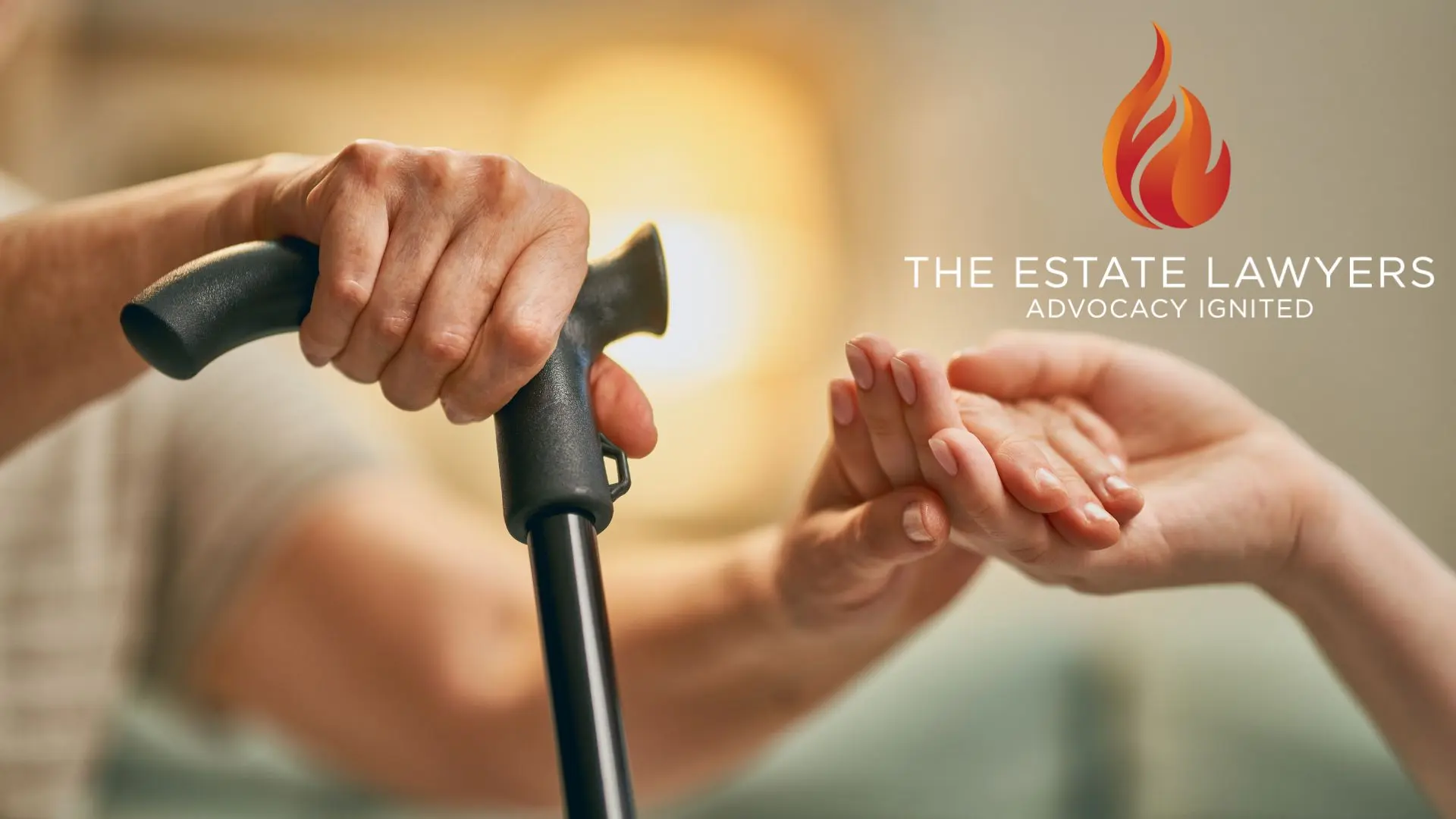 Hands holding cane and offering support