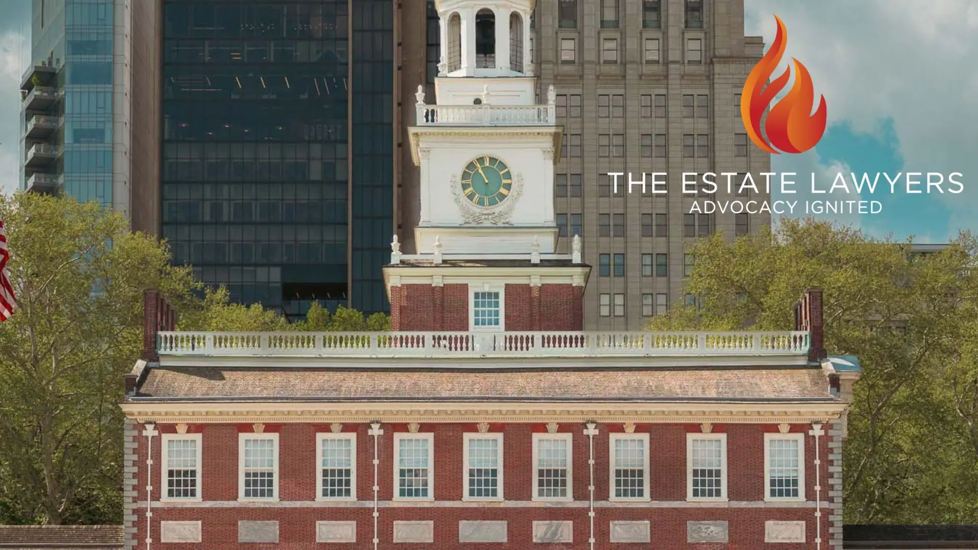 Independence Hall with clock tower and American flag