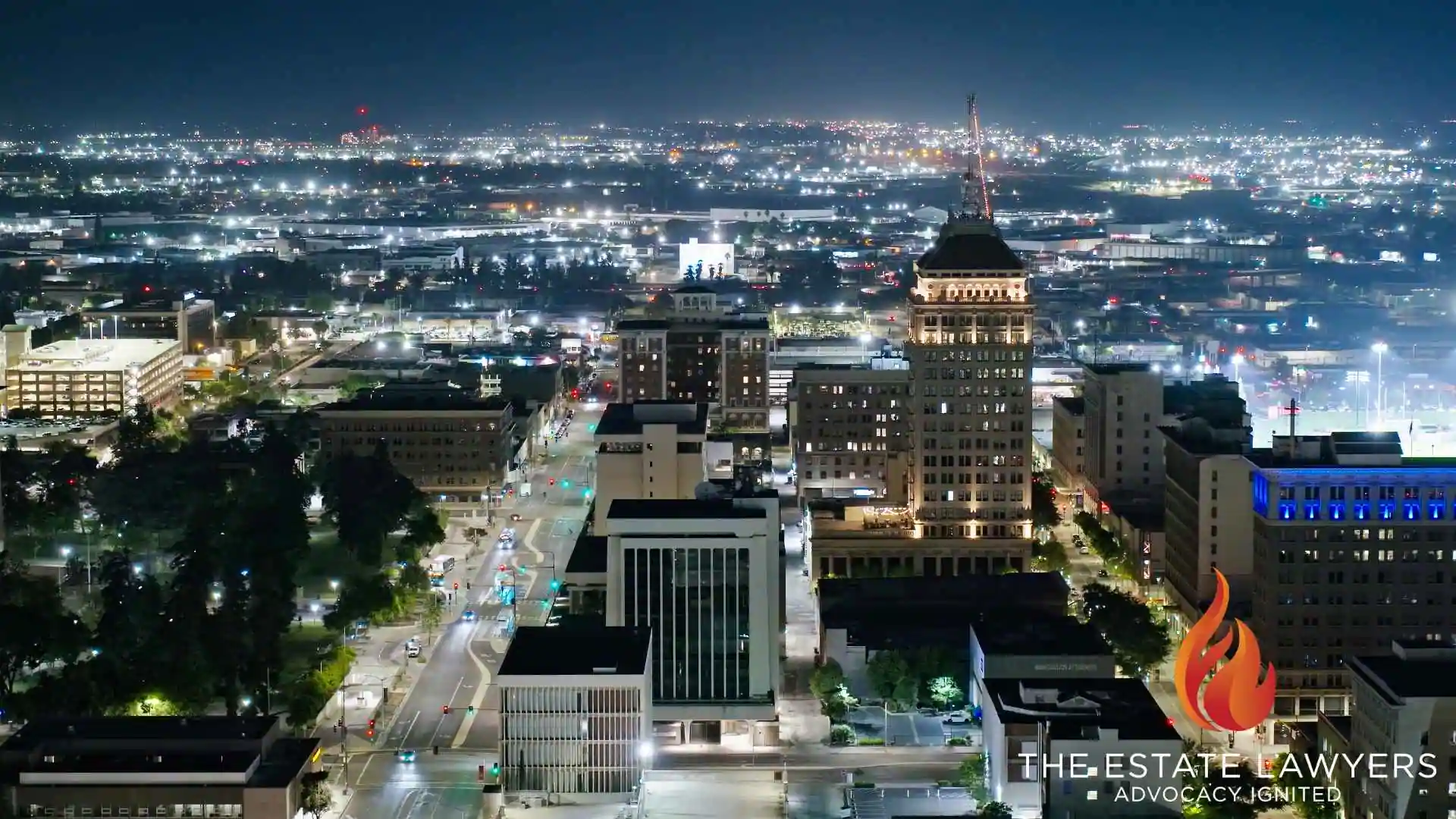 Illuminated downtown skyline and Fresno, CA - estate lawyer