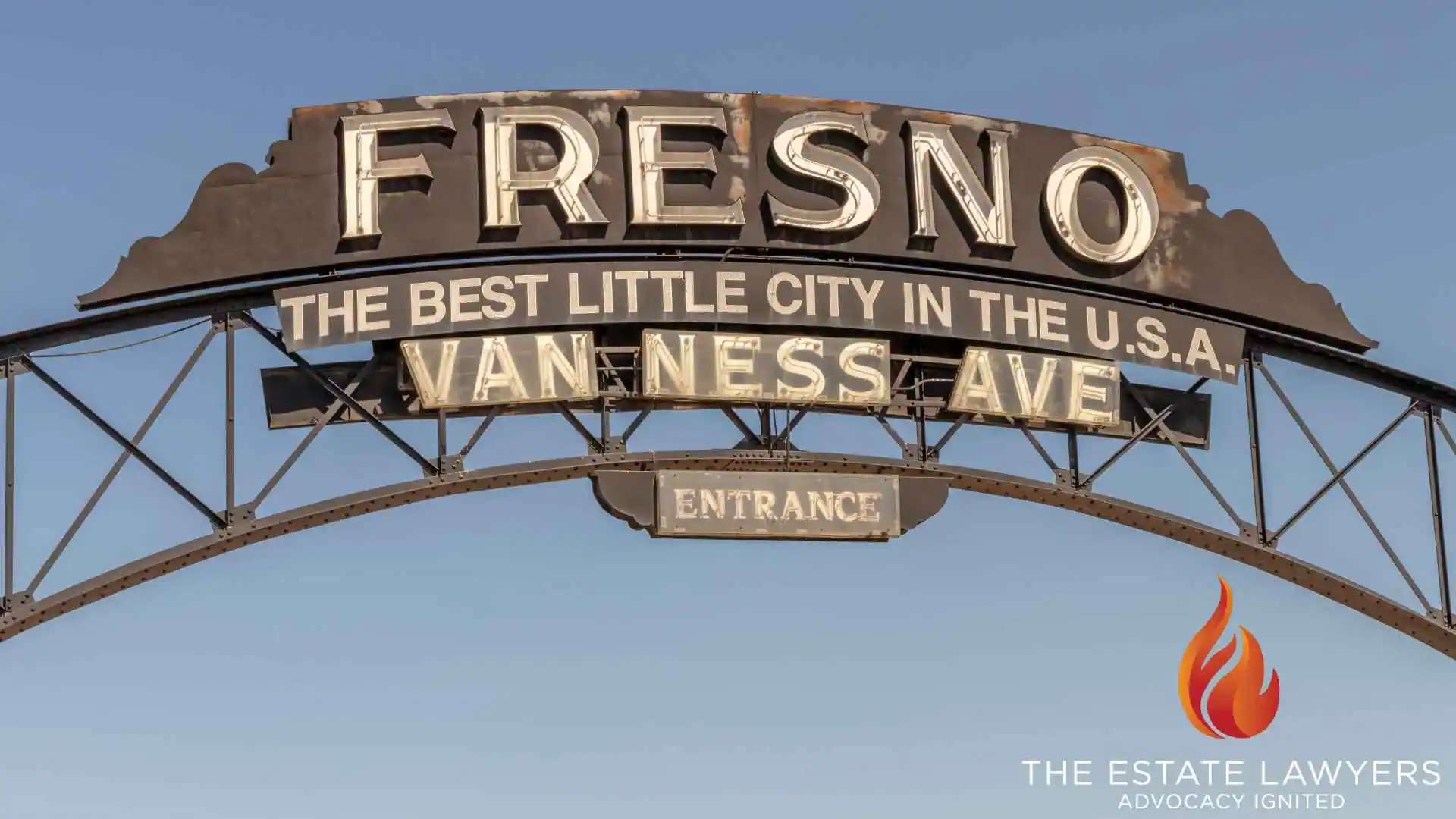 The Fresno, CA skyline at dusk, home to families who rely on probate litigation attorneys in Fresno to resolve contested estate and trust disputes. Branded with The Estate Lawyers, APC logo.